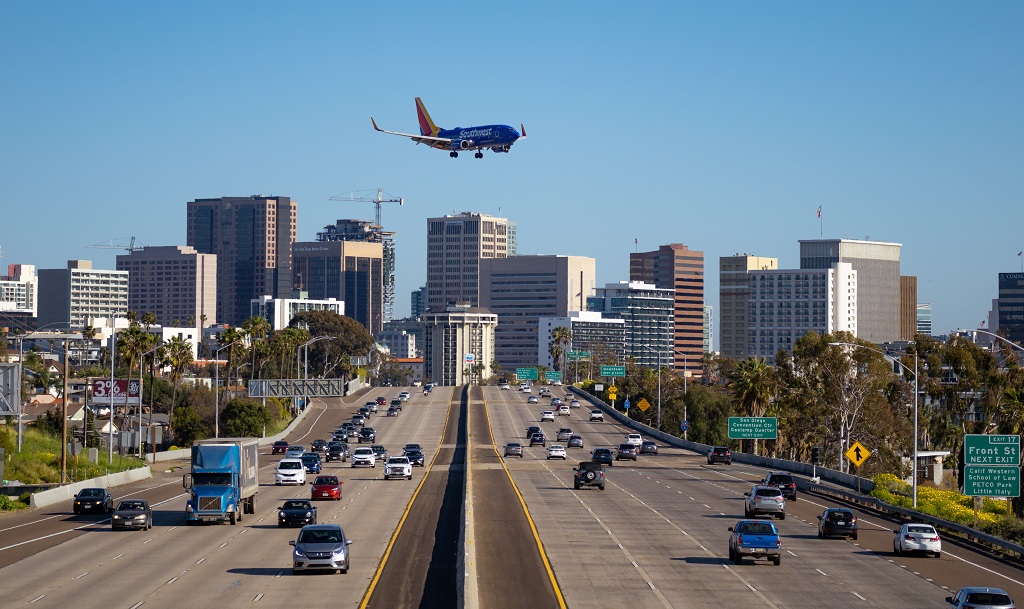 Plane over freeway in San Diego, CA