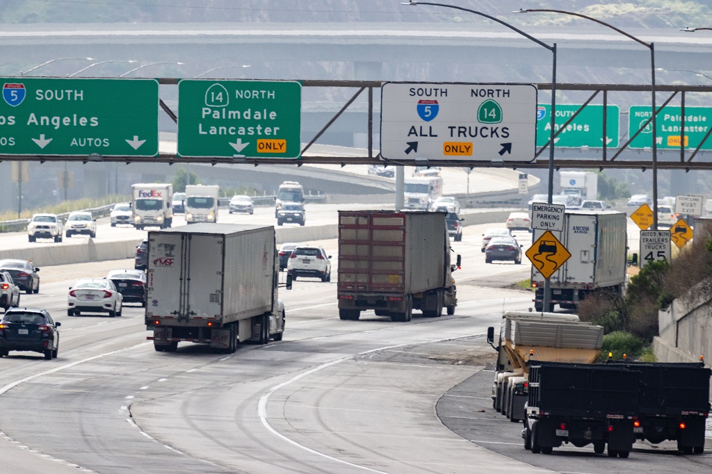 Greenhouse gas producers: Cars and trucks on highway