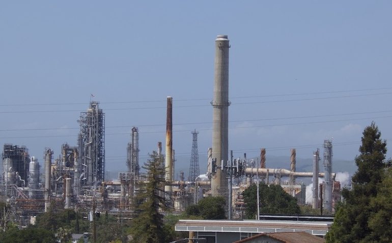 Martinez Environmental Score: Hazardous Refinery Emissions / Martinez Refinery against hazy blue skyImage credit: Mark Stafforini