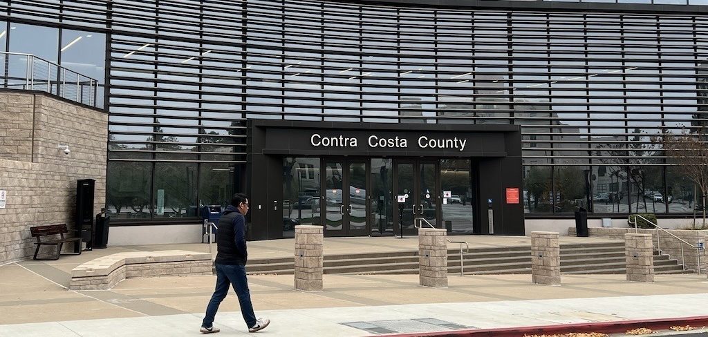 Find climate action in CC County Man walking in front of the Contra Costa County Administrative Building Climate Action in Contra Costa | Connect and Make A Difference Climate Action in Contra Costa | Connect and Make A Difference