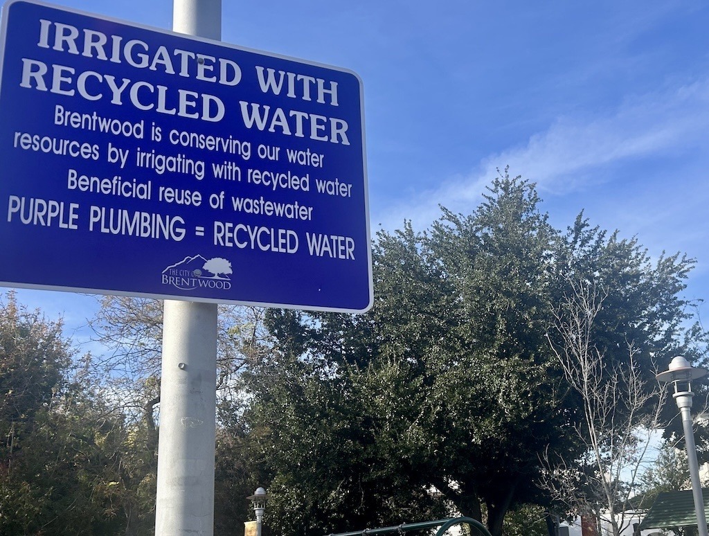The city has been active in conservation, adopting a Conservation & Open Space element in its General Plan | Brentwood Purple Plumbing Water Reuse Notice at City Park | Image credit: Anne Grenier