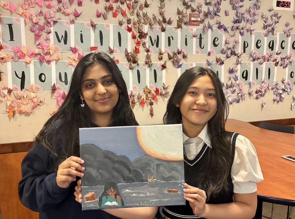 Second Hand Smoke | 350 Contra Costa Action Poet Suhani Goyal and artist Amber Sabrina of Doughtery Valley High School, San Ramon, CA, pose with Amber’s painting inspired by Suhani’s poem, “Second Hand Smoke"