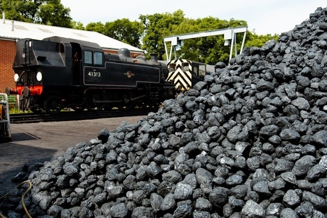 Train traveling past a pile of coal Image credit: Unsplash Martinez CA Climate Action & Advocacy - 350 Contra Costa Action